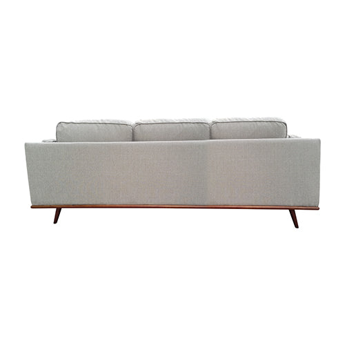 Beige fabric 3-seat sofa side view with back cushions and tapered wooden feet