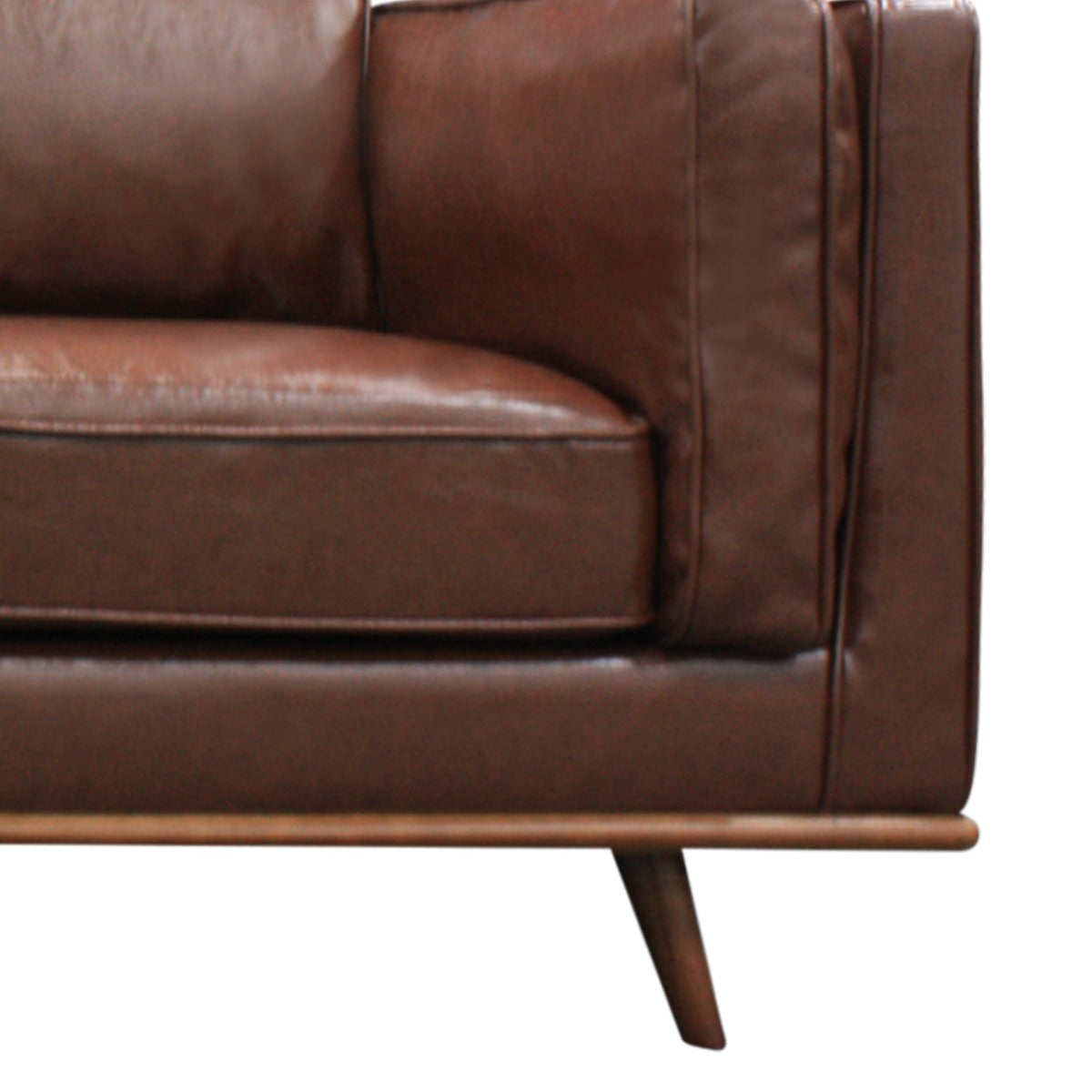 Brown faux leather sofa with armrest, padded seat cushion, and slim wooden legs