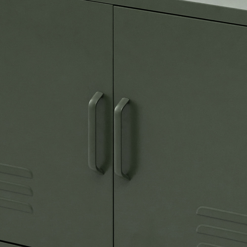 Dark green metal cabinet doors with vertical bar handles and embossed panel detailing.