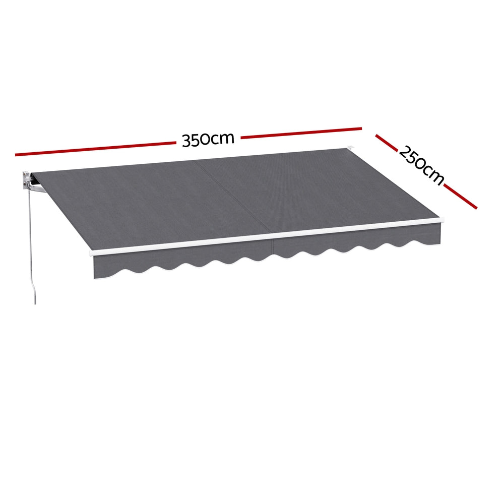 Grey motorized retractable arm awning with scalloped valance, length and width shown