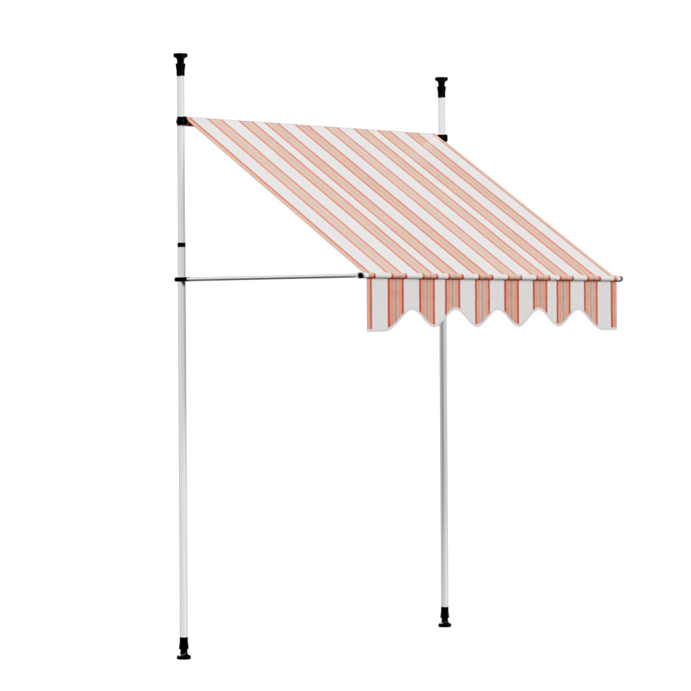 Outdoor fixed pivot arm awning with striped beige-and-brown fabric and scalloped valance