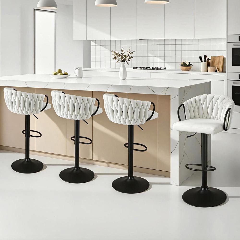 Set of ivory woven velvet bar stools with black swivel bases and footrests