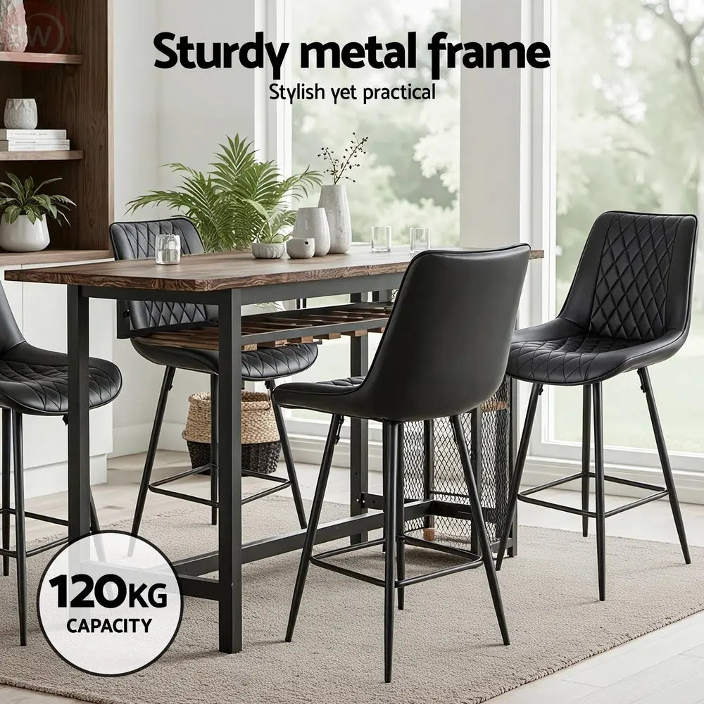 Black diamond-quilted PU bar stool with padded curved seat, metal frame, and footrest