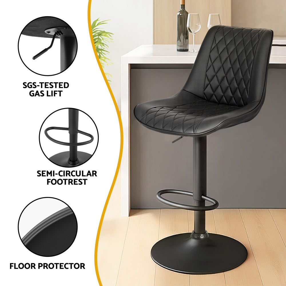 Black swivel bar stool with semi-circular footrest and round floor base