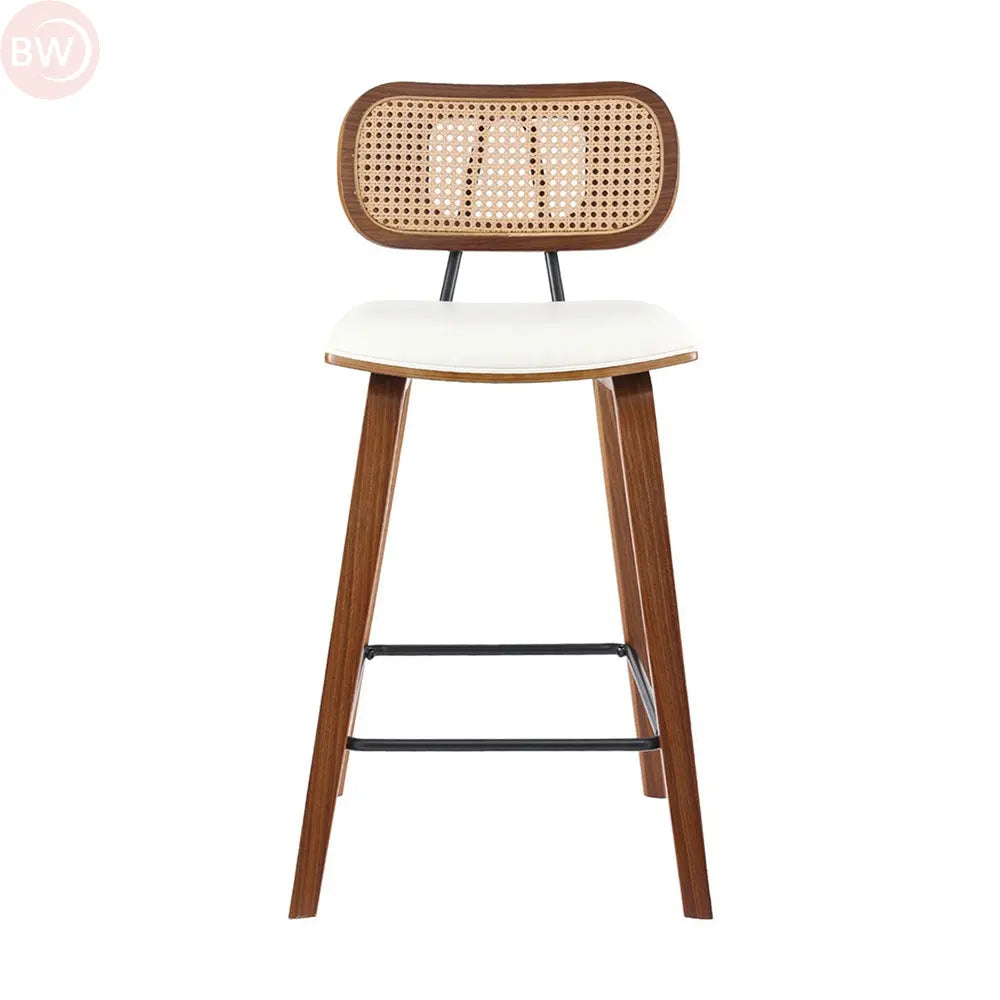 Rattan bar stool with woven backrest and white padded seat, tapered wooden legs
