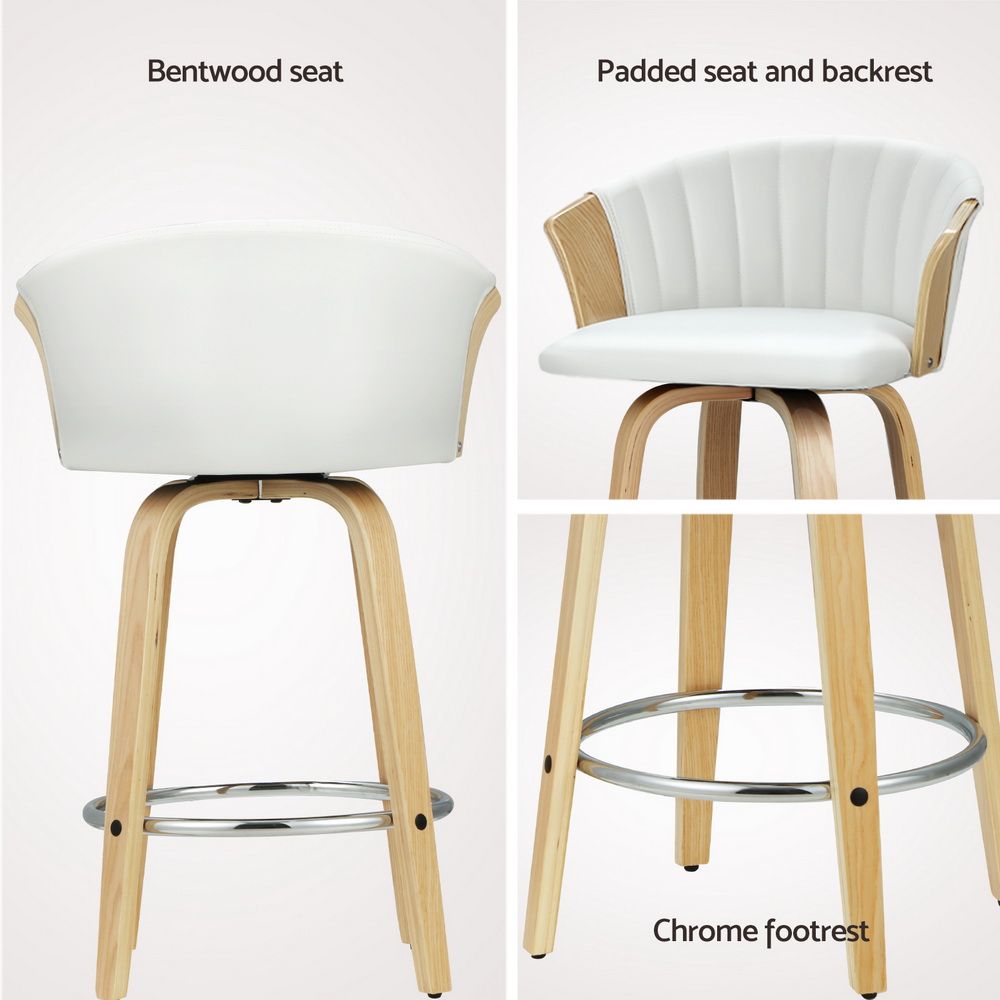 White padded bar stool with arched wooden back, contoured seat, and chrome footrest.