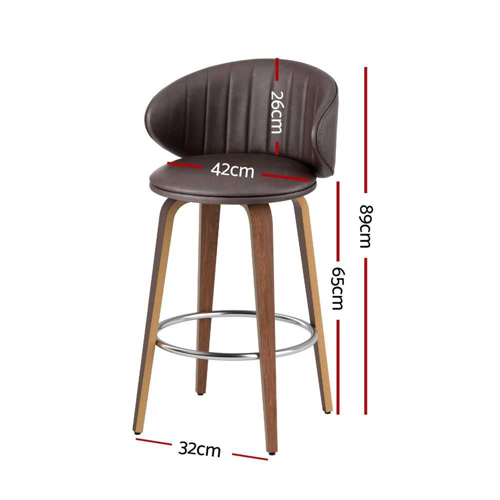 Bar stool with dark brown upholstered seat and contoured back, chrome footrest, wooden legs