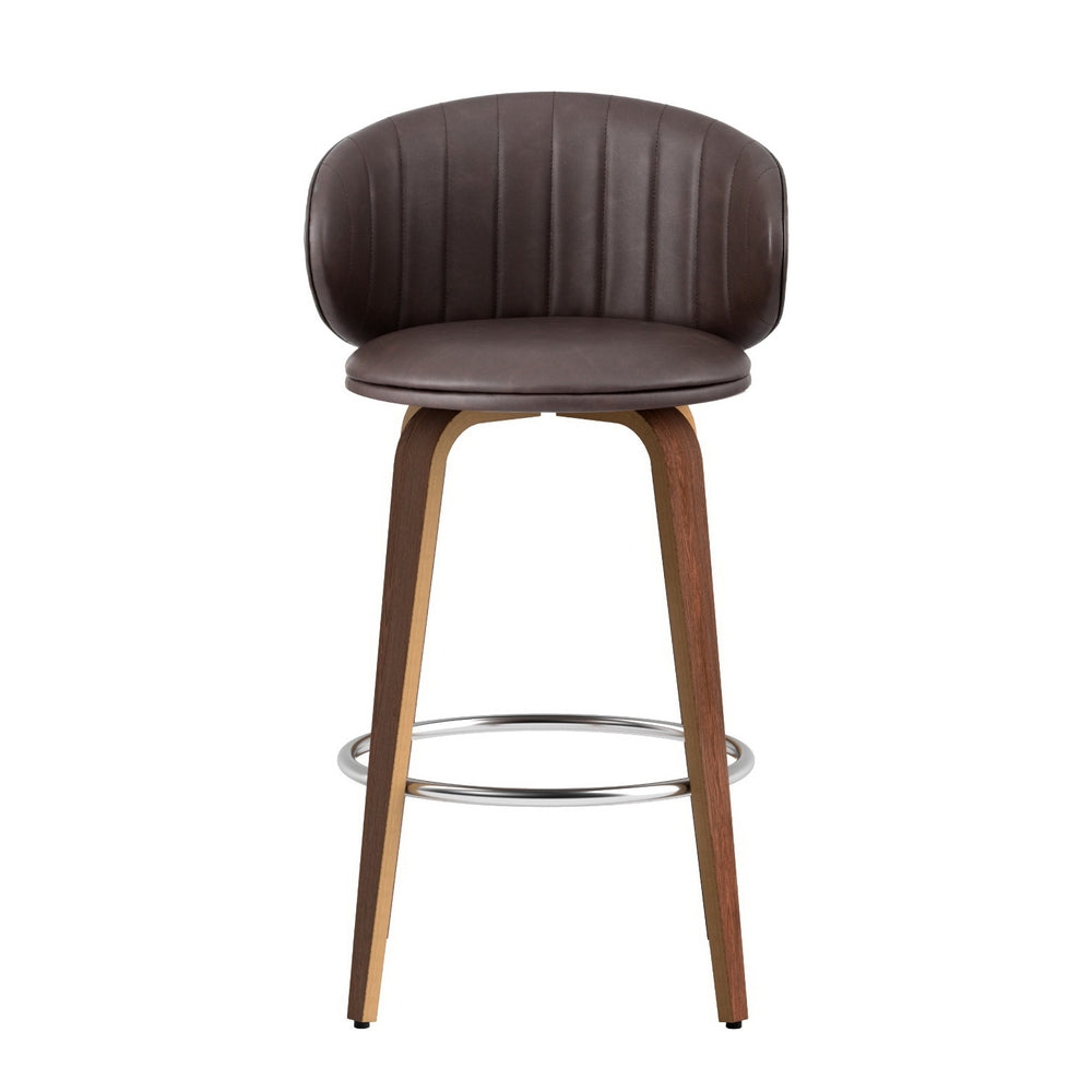 Contoured bar stool with dark brown padded seat, curved backrest, chrome ring footrest, wood legs