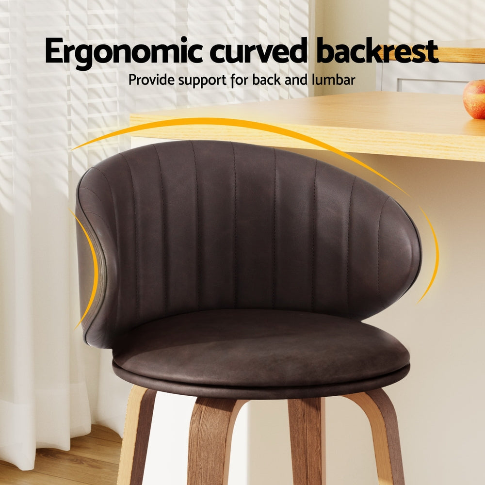 Bar stool with dark brown curved backrest and padded seat, chrome footrest, wooden legs