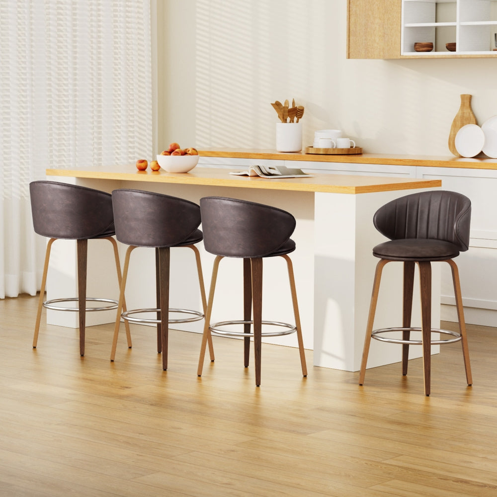 Bar stool set with dark brown seats, contoured curved backs, chrome footrests, wooden legs