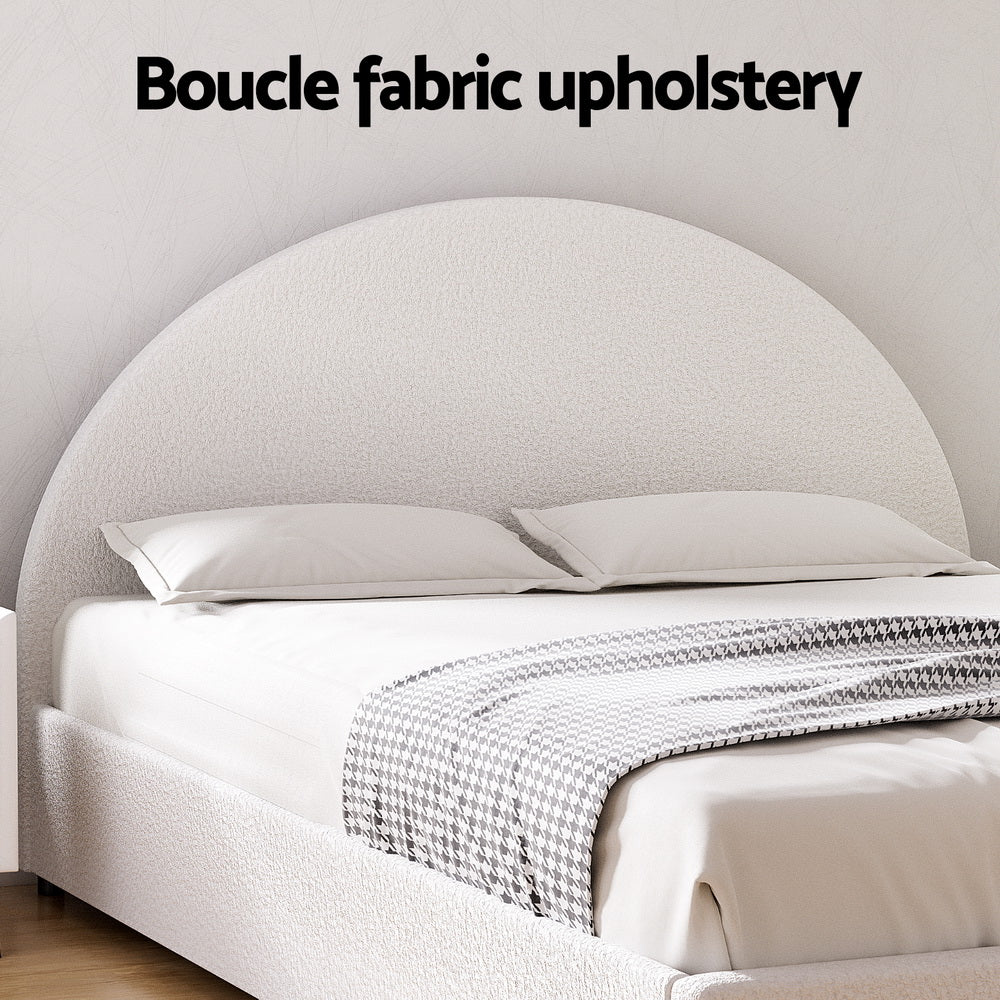 Light beige boucle bed frame with padded rounded headboard and matching upholstered base