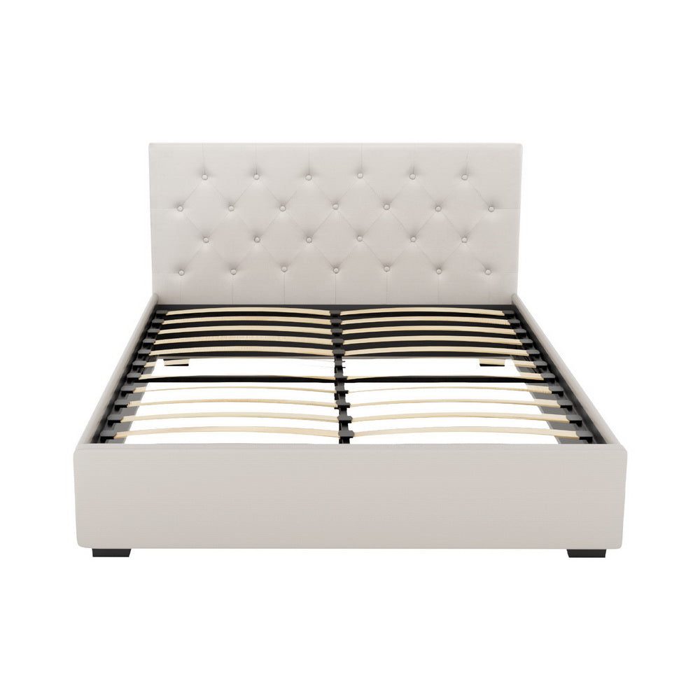 Beige double bed frame with button-tufted headboard and black slatted support