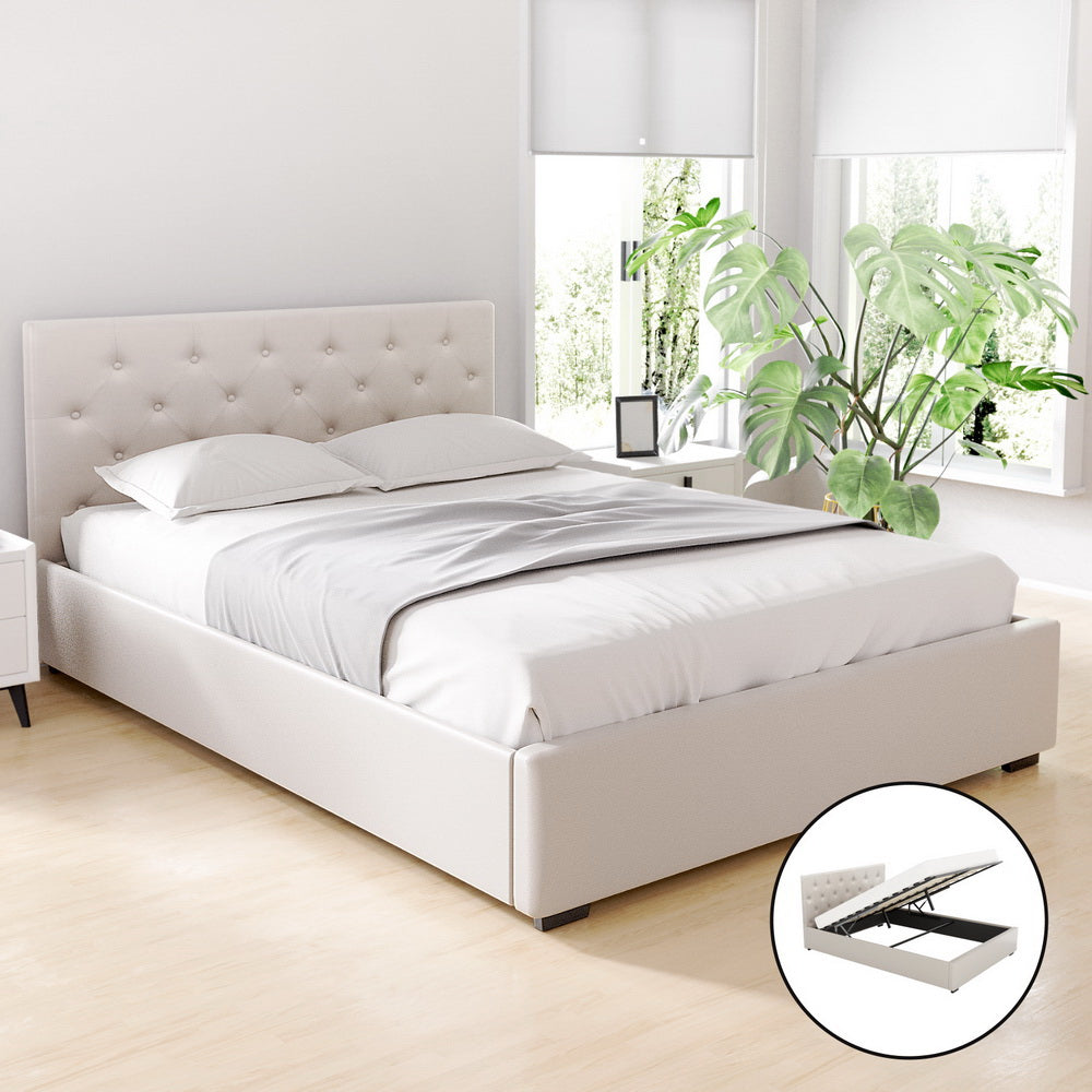 Beige upholstered double bed frame with tufted headboard and gas-lift storage base