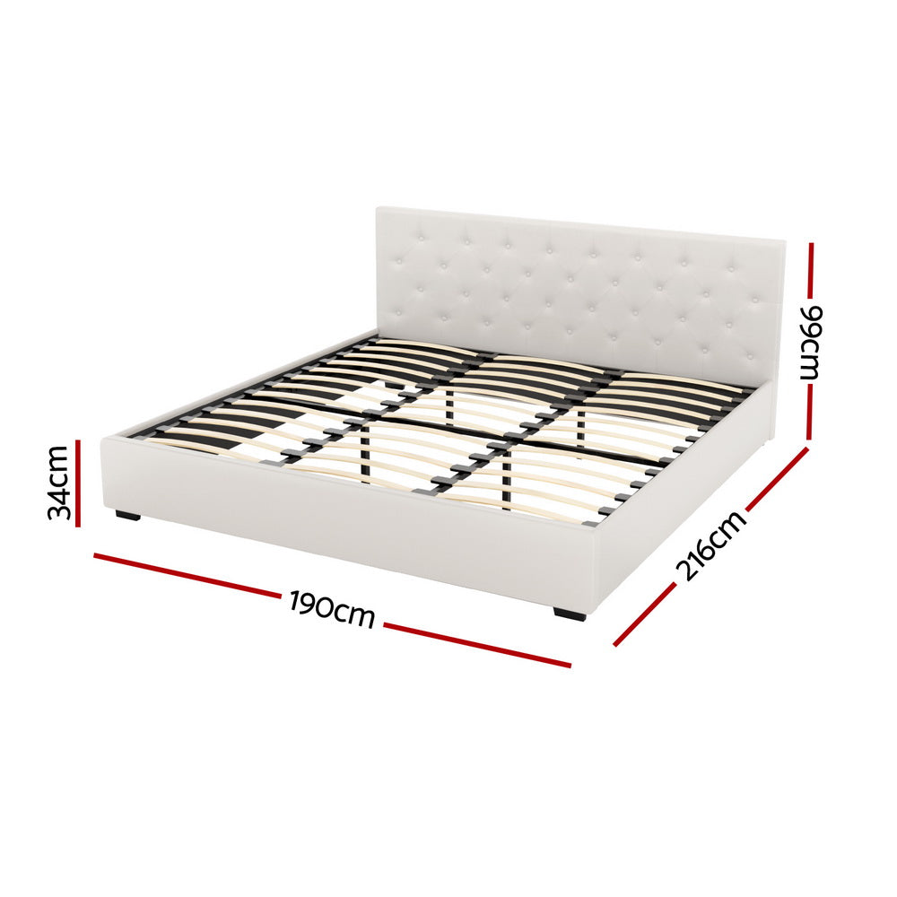 Beige king bed frame with tufted headboard and slatted support platform