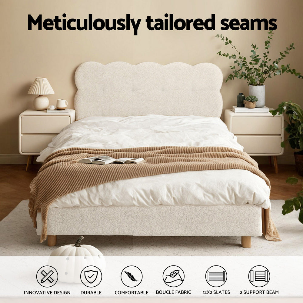 Light boucle fabric bed frame with tall cloud headboard and padded platform base