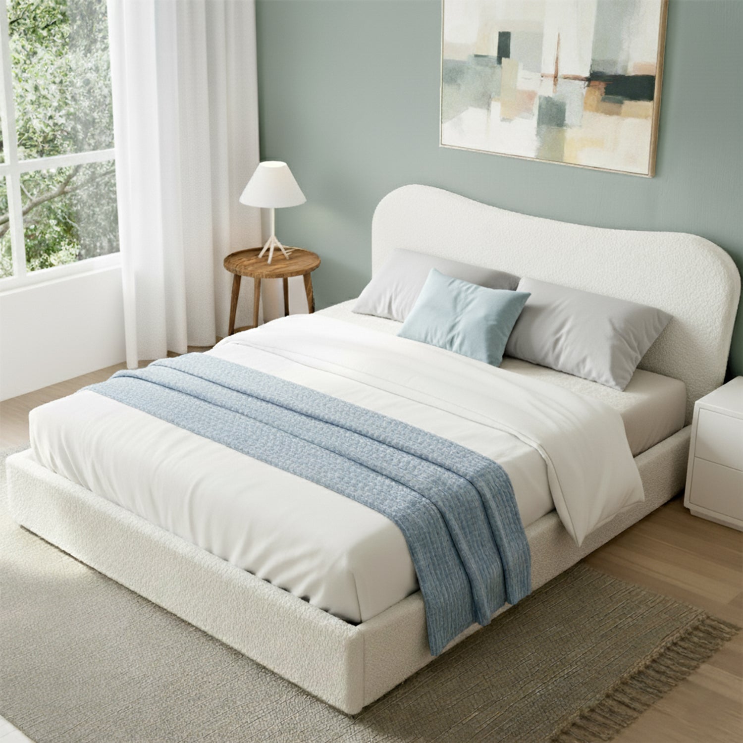 Upholstered white boucle queen bed with curved headboard and low base