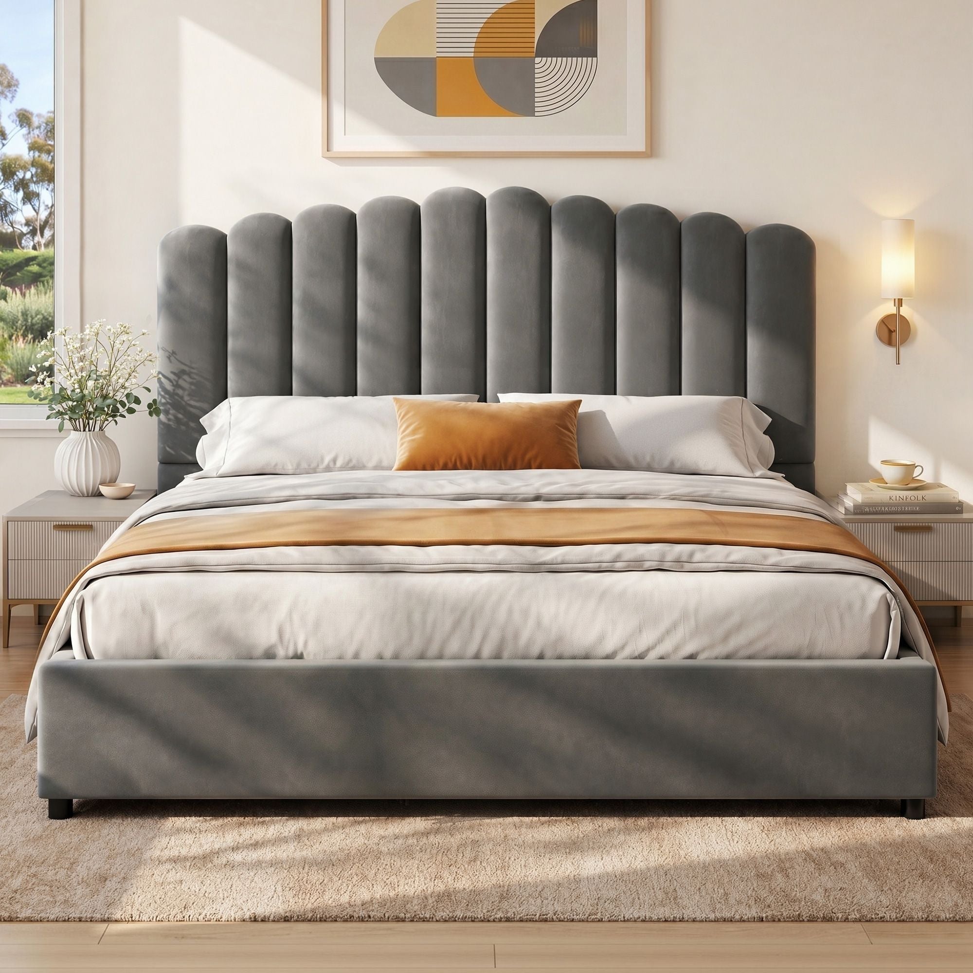 Grey velvet king bed frame with tall scalloped headboard and upholstered side rails