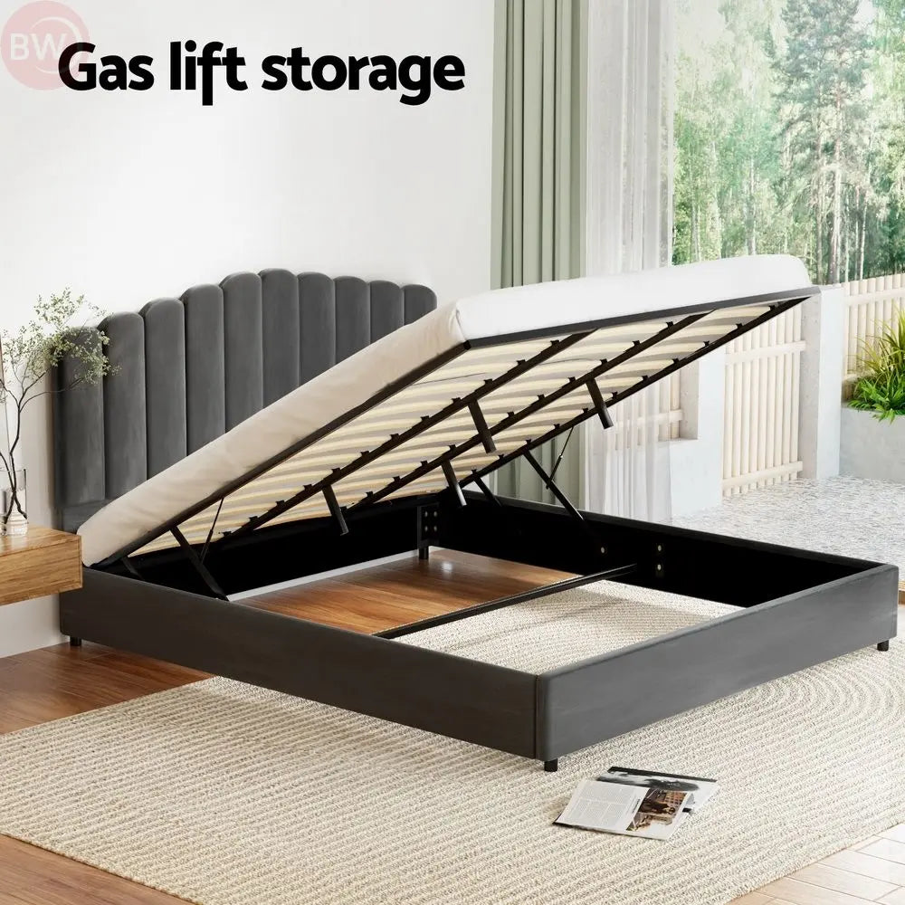 Grey upholstered bed frame with gas-lift storage base and tall headboard