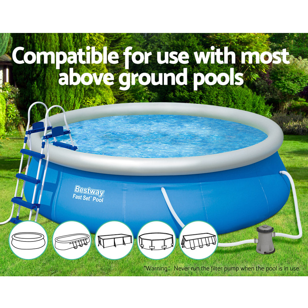 Above-ground pool pump system attached to a blue pool with grey filter unit