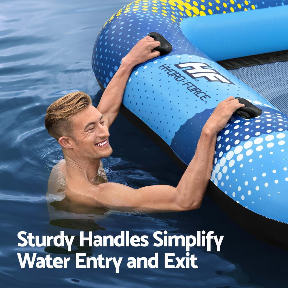 Inflatable pool lounger with blue dotted side, black handles, and white top rails