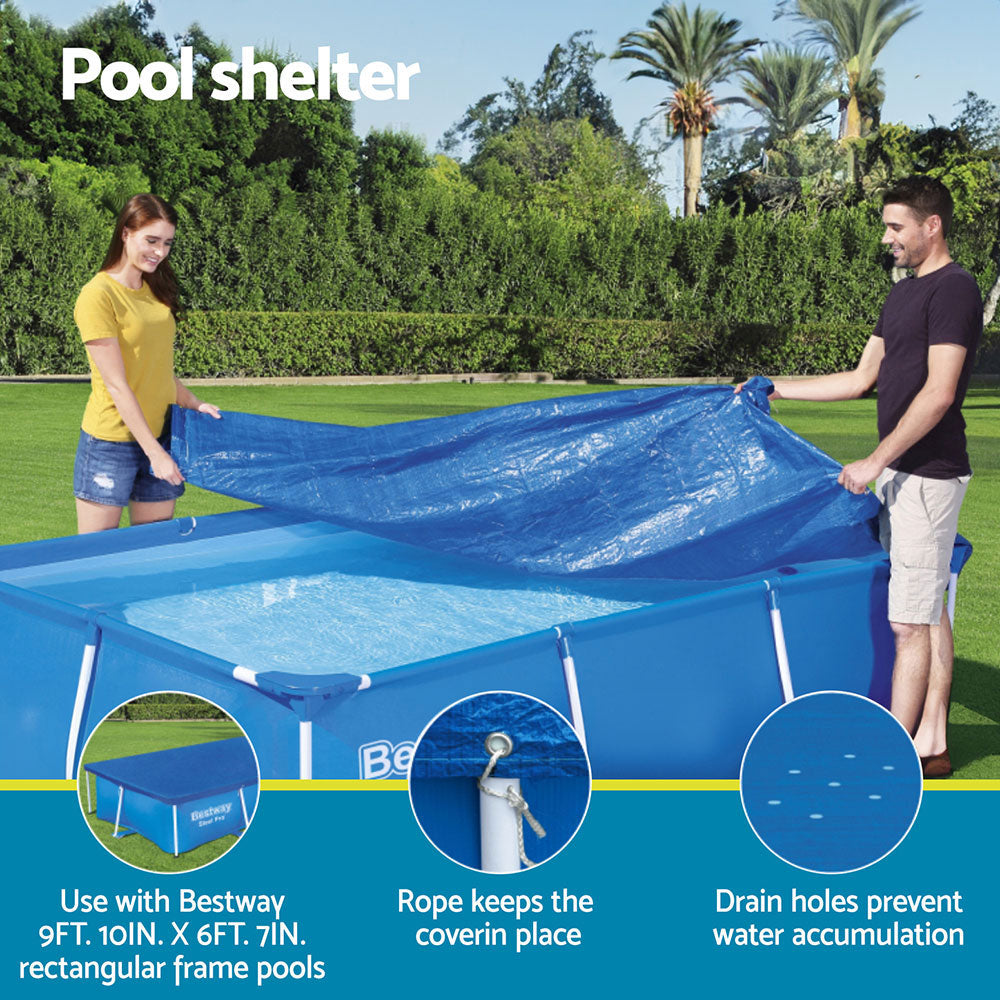 Blue rectangular pool cover with securing rope and drain holes