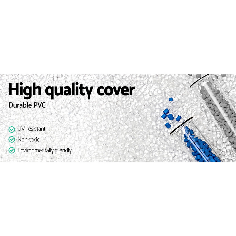 Rolled black PVC pool cover with small accessories shown on white background