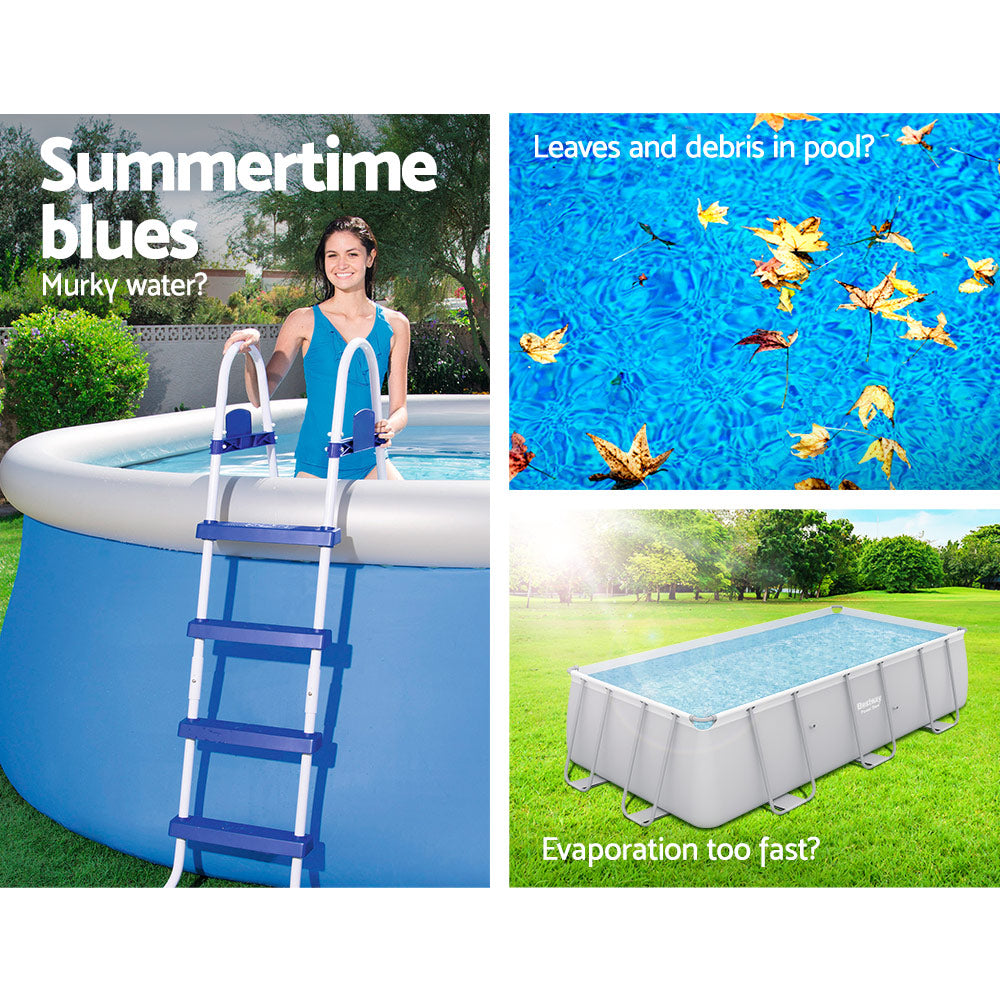 Rolled dark blue PVC pool cover on grass, compact bundle view