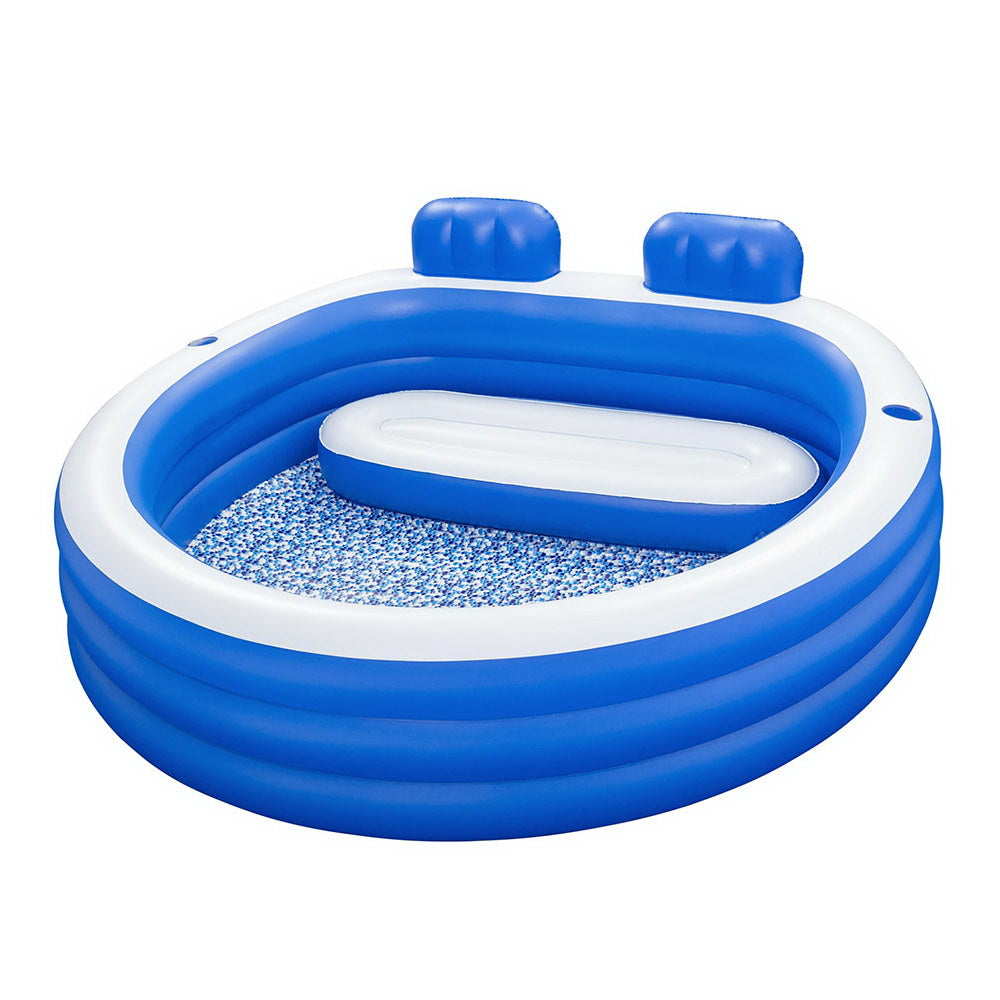 Blue and white inflatable kids pool with built-in lounge bench and two headrests
