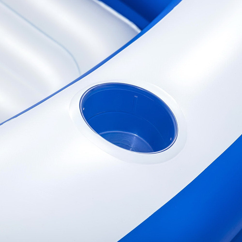 Inflatable pool drain/valve opening in the white floor with a blue insert