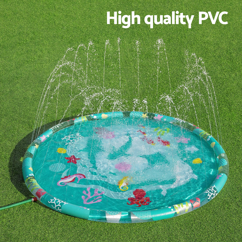 Teal round inflatable splash pool spraying water over marine-themed surface