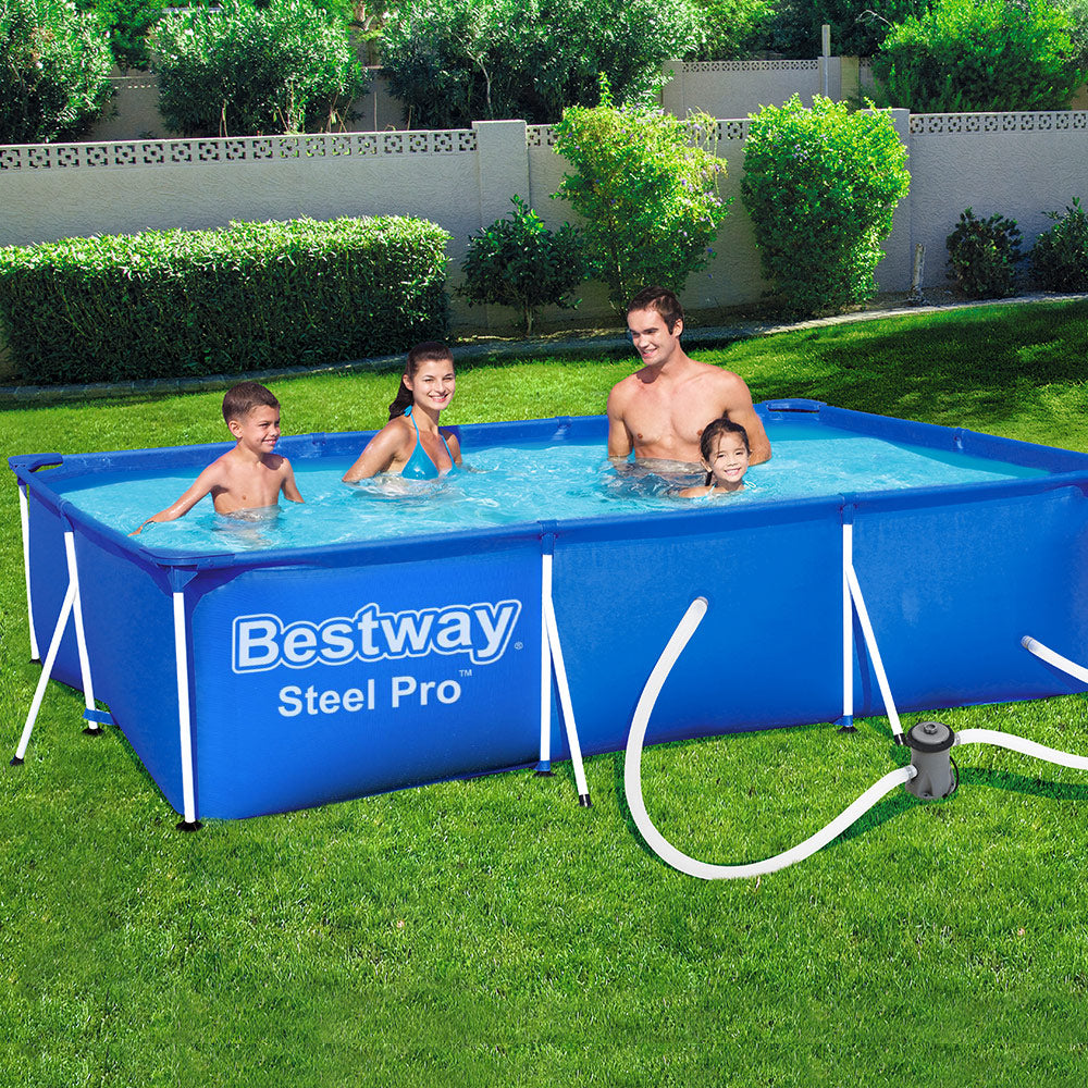 Blue Bestway Steel Pro above-ground pool with family swimming on lawn