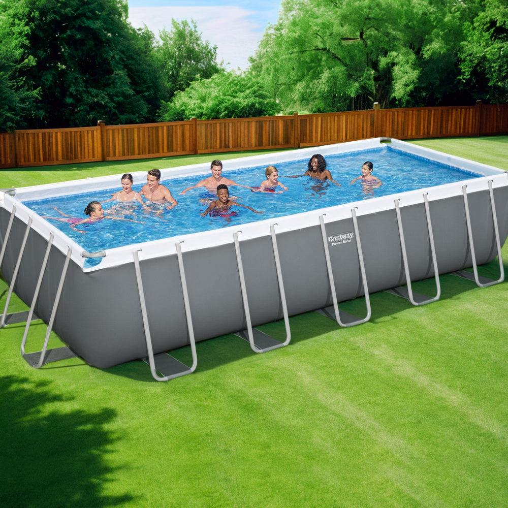 Above-ground swimming pool with blue water and gray steel frame with white top rails