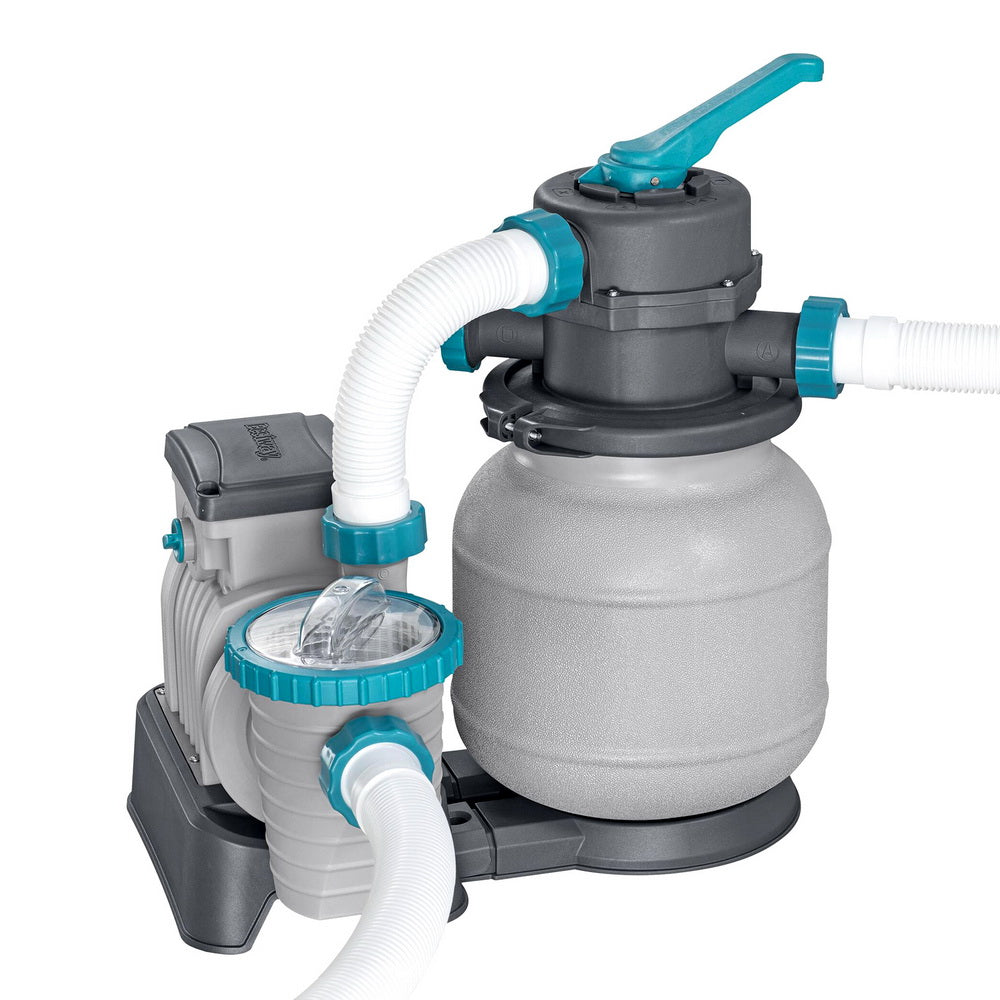 Pool sand filter pump with clear valve top and connected white hoses