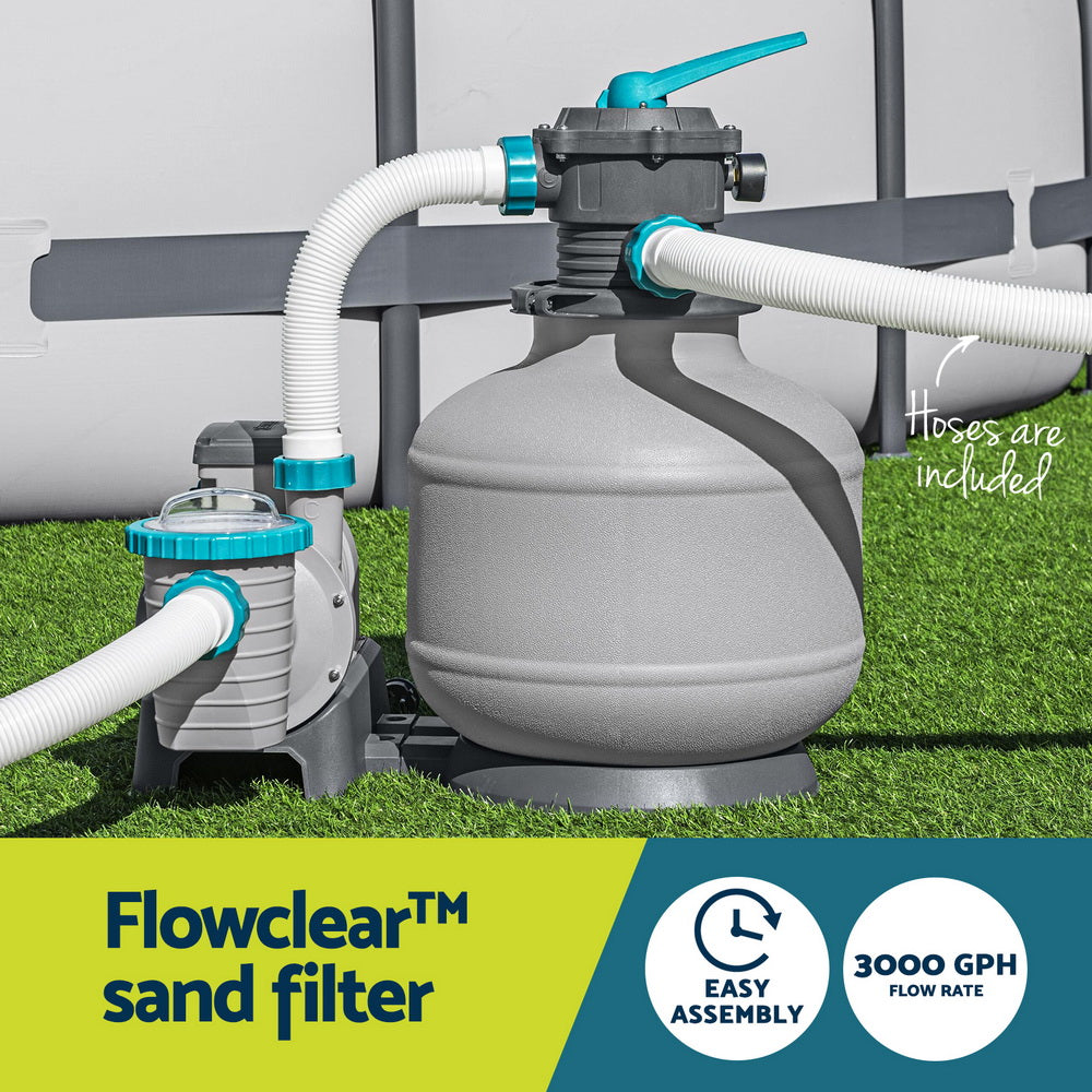Pool sand filter pump with gray tank and white hoses for pool filtration