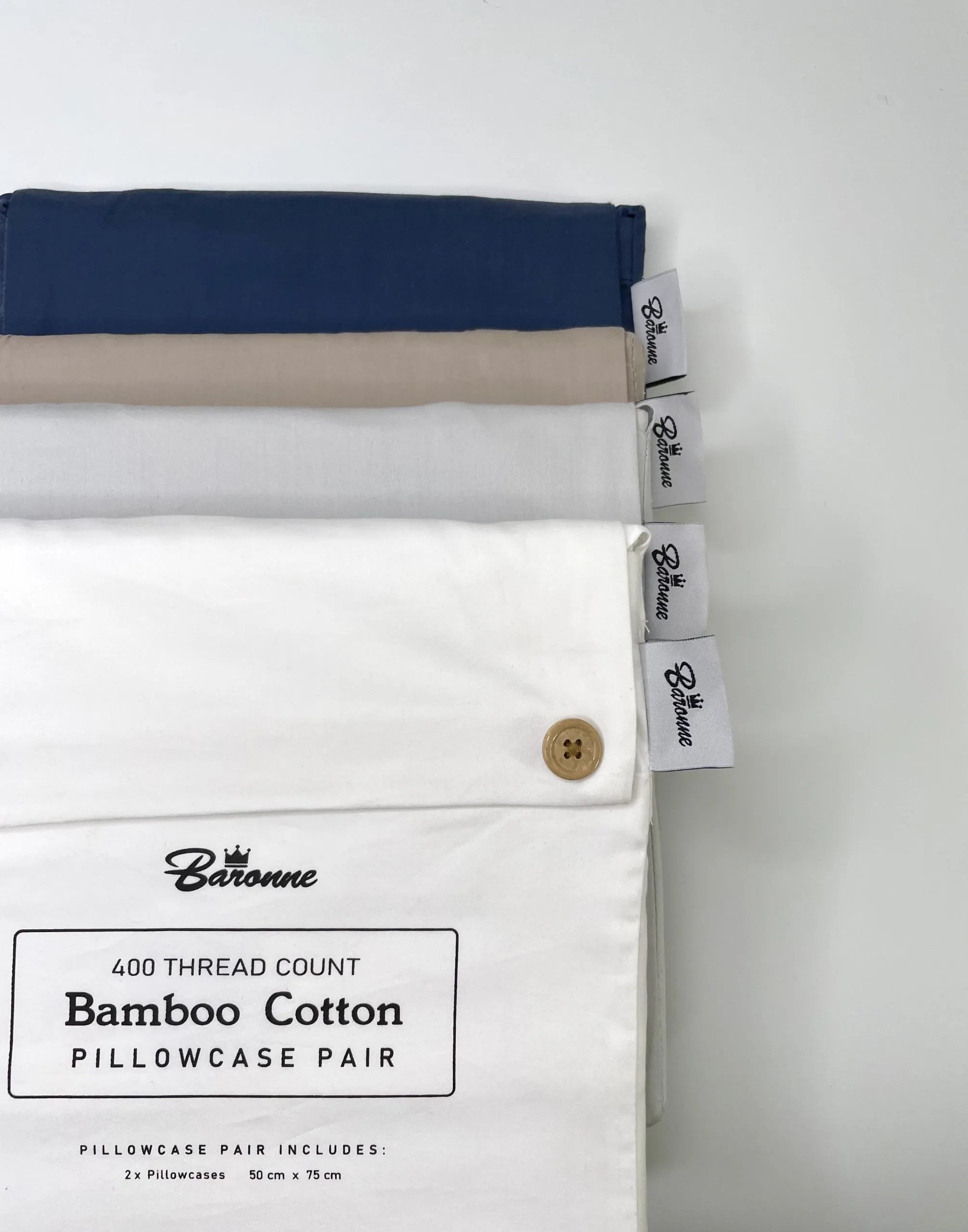 Bamboo cotton pillowcases with Baronne branding on a white background