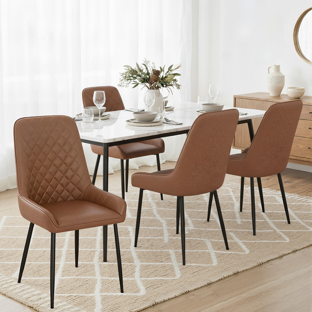 Brown PU leather dining chairs with diamond-quilted backs and black metal legs around a table