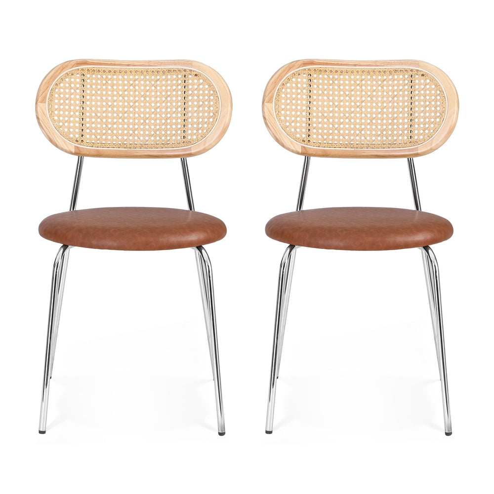 Set of dining chairs with oval woven rattan-style back, brown seat cushions, chrome legs