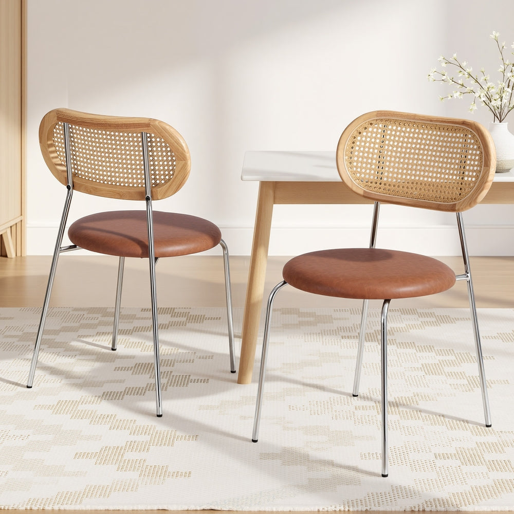 Dining chairs with woven rattan-style back and brown seats, chrome frames, standing on legs