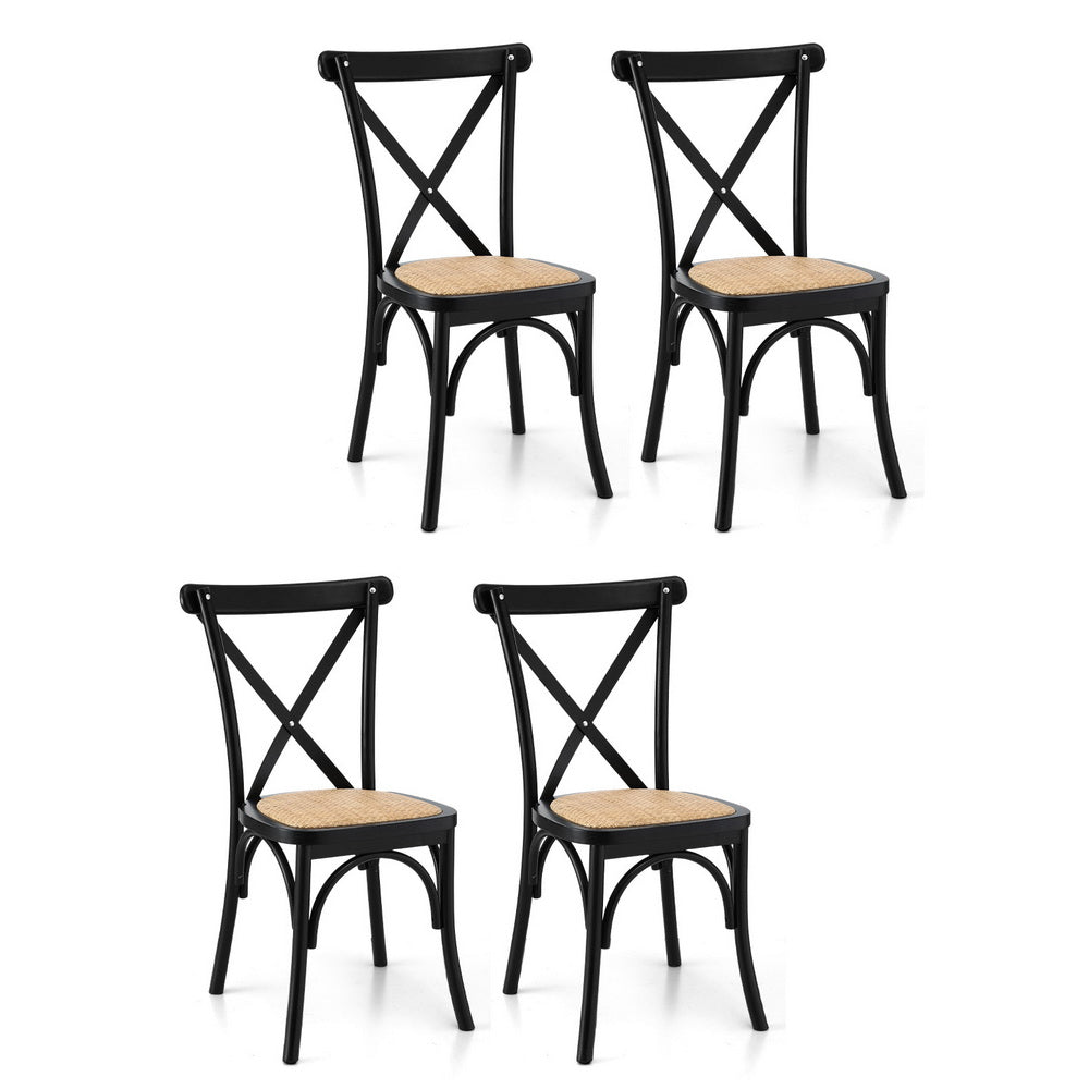 Set of four dining chairs with black frames and round wood-tone seats