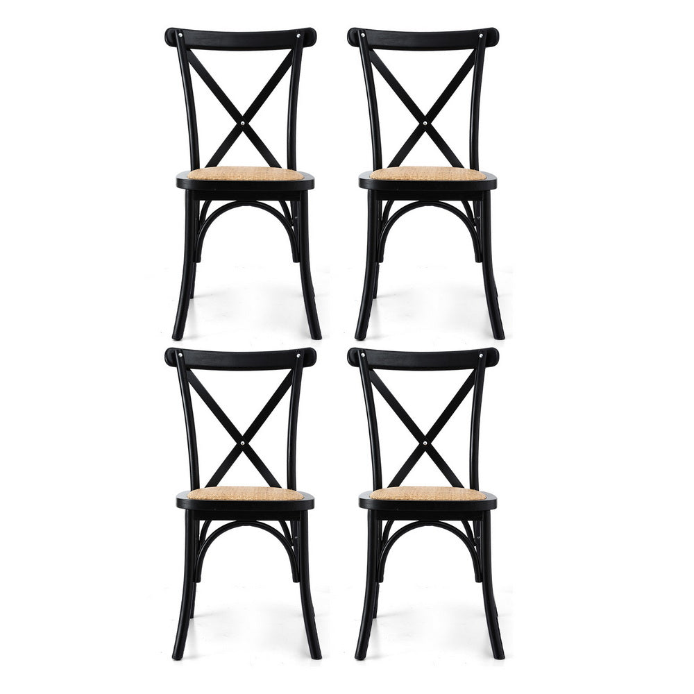 Set of four black dining chairs with cross-back frames and wood-tone seats