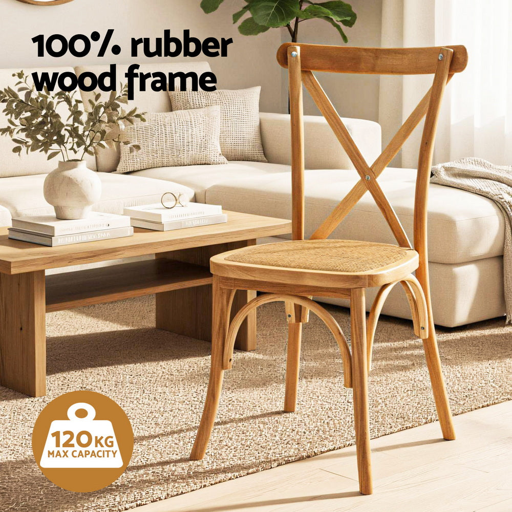 Wood dining chair with woven seat, cross-back frame, and curved arched legs