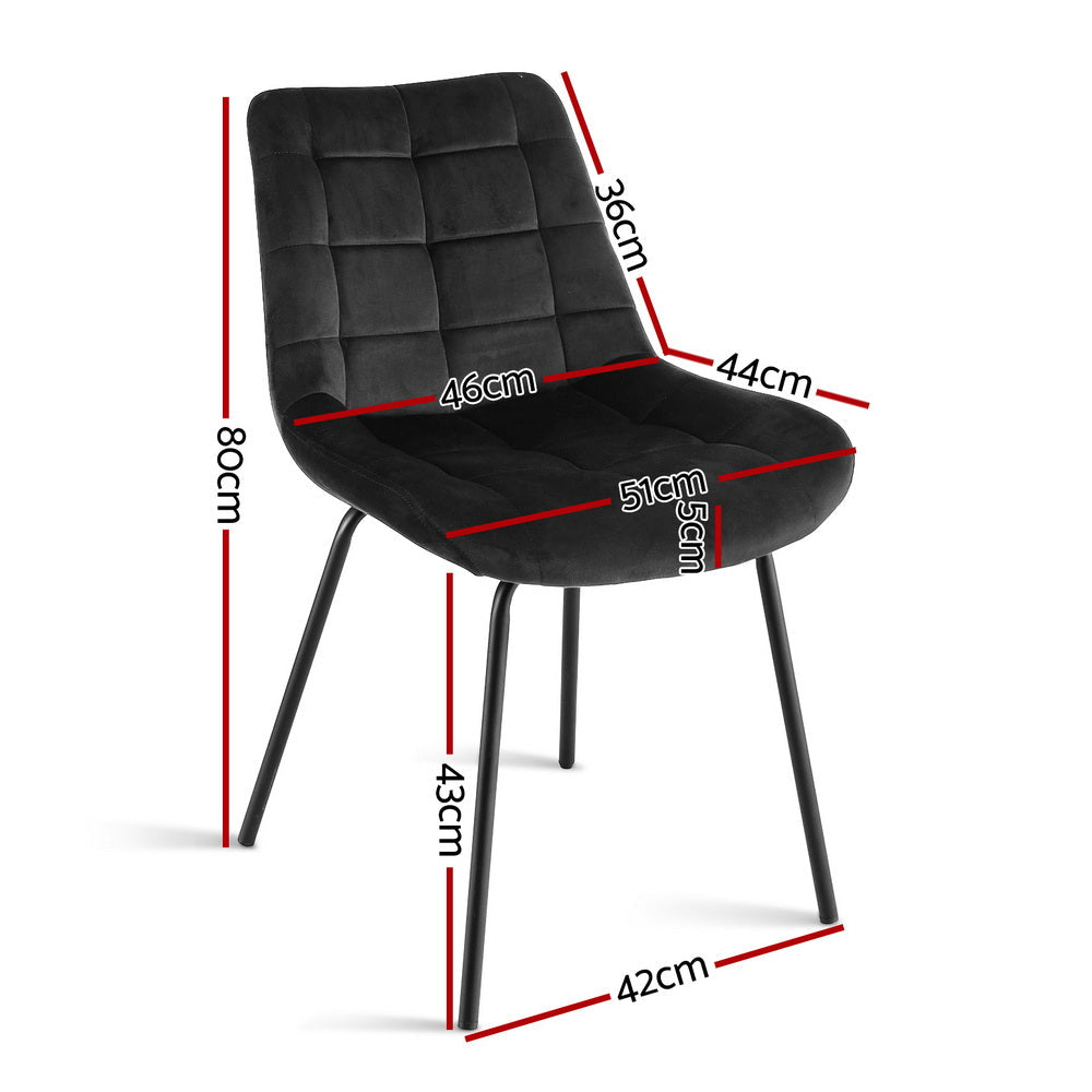 Black velvet tufted dining chair, arched seat and square-pattern back, metal legs