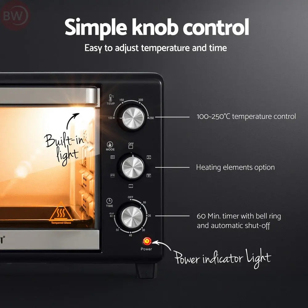 Electric convection oven control panel close-up with three knobs and bright interior light through door