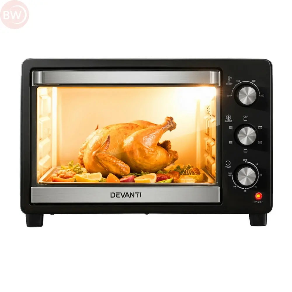 Electric convection oven with door open, black body, control knobs on right, roast chicken inside