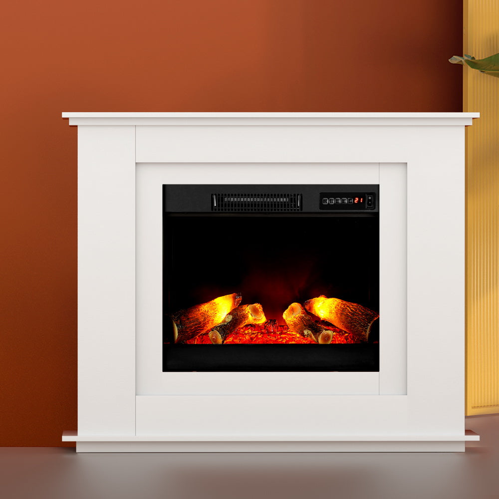 White electric fireplace heater with inset flame window and control panel.