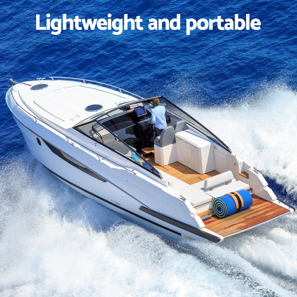Blue rolled floating water foam mat with yellow stripe on boat deck