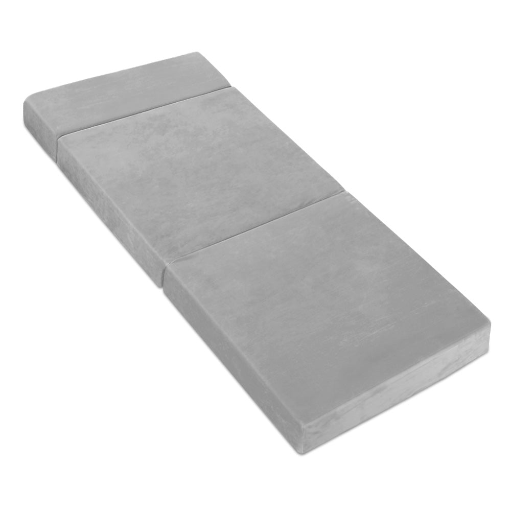 Light grey foldable foam mattress mat, unfolded and laid flat