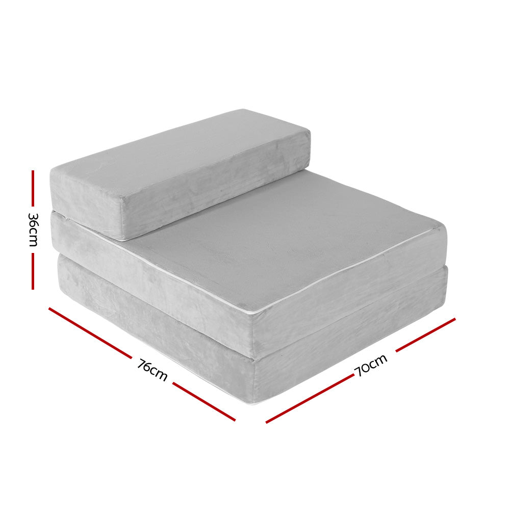 Light grey foldable foam mattress mat folded into a compact two-layer stack