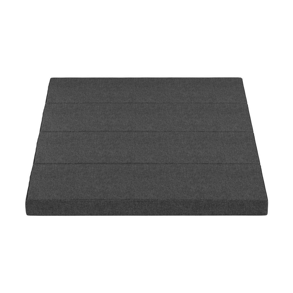 Dark gray foldable foam mattress with stitched seams, flat top
