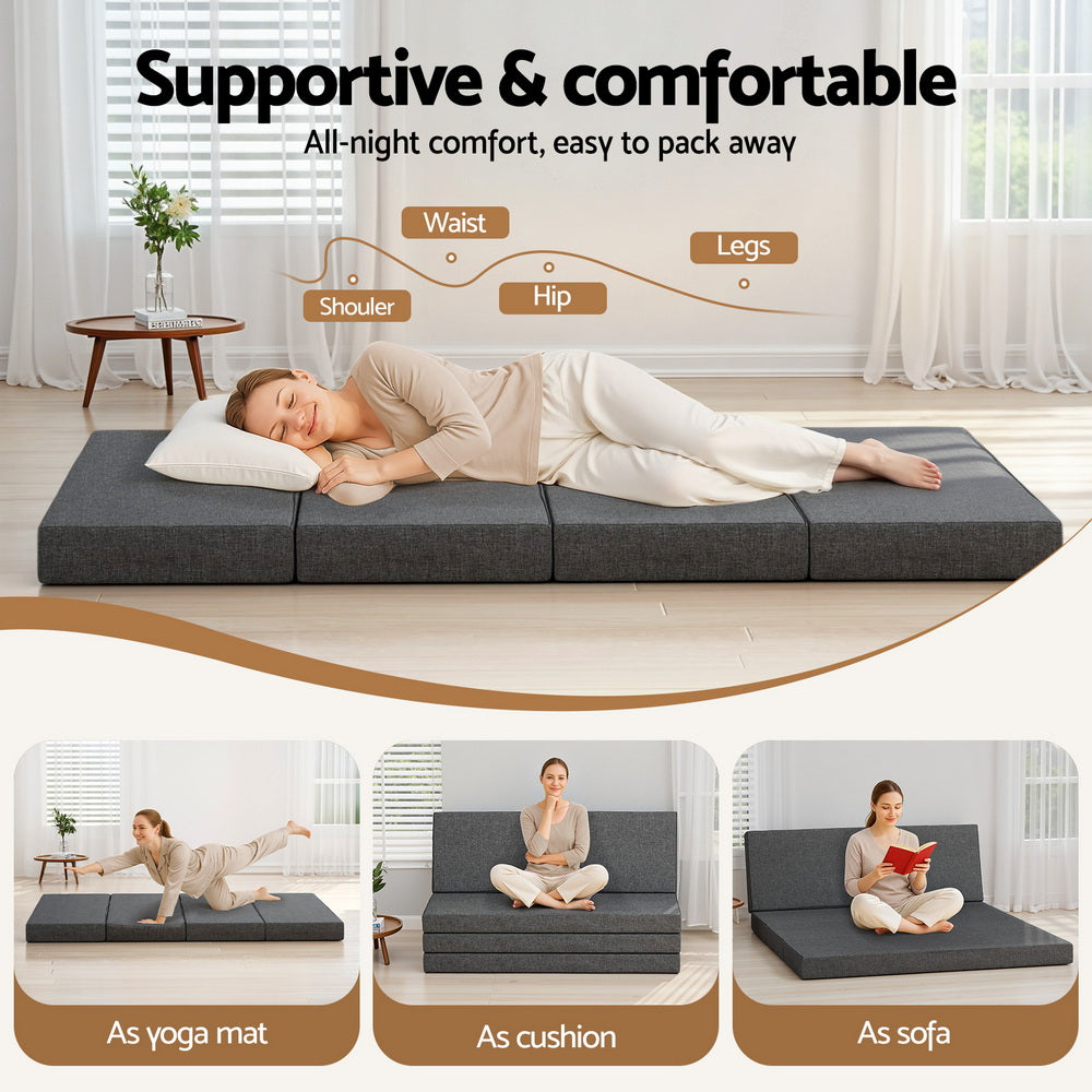 Sectioned folding foam mattress shown in use by two people